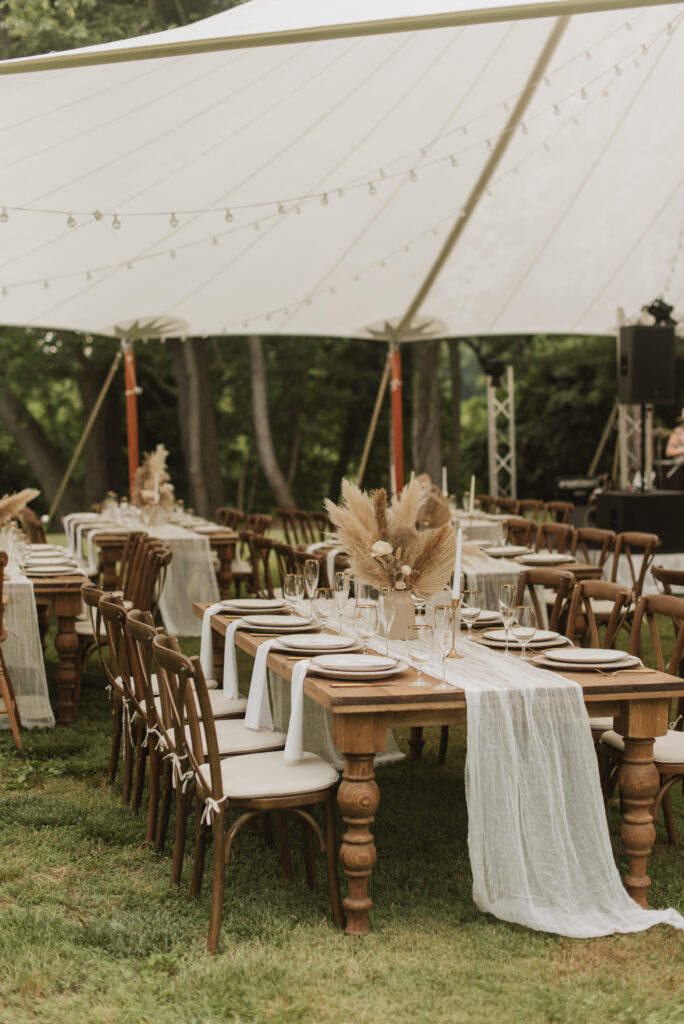 elegant country wedding with neutral colored decor and pampas bouquets at an Annapolis, Maryland family farm wedding