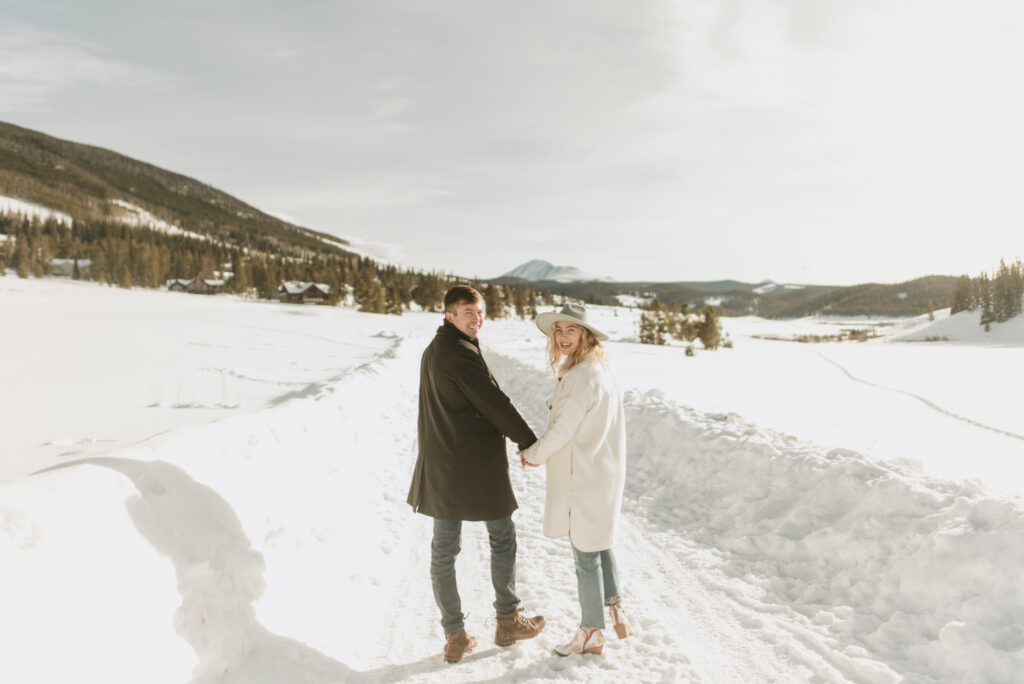 snowy colorado mountain winter engagement photos at keystone