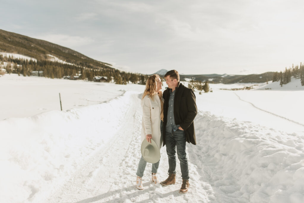 snowy colorado mountain winter engagement photos at keystone