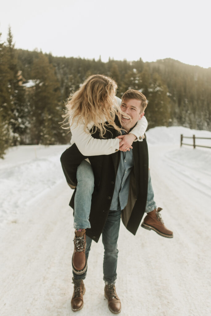 snowy colorado mountain winter engagement photos at keystone