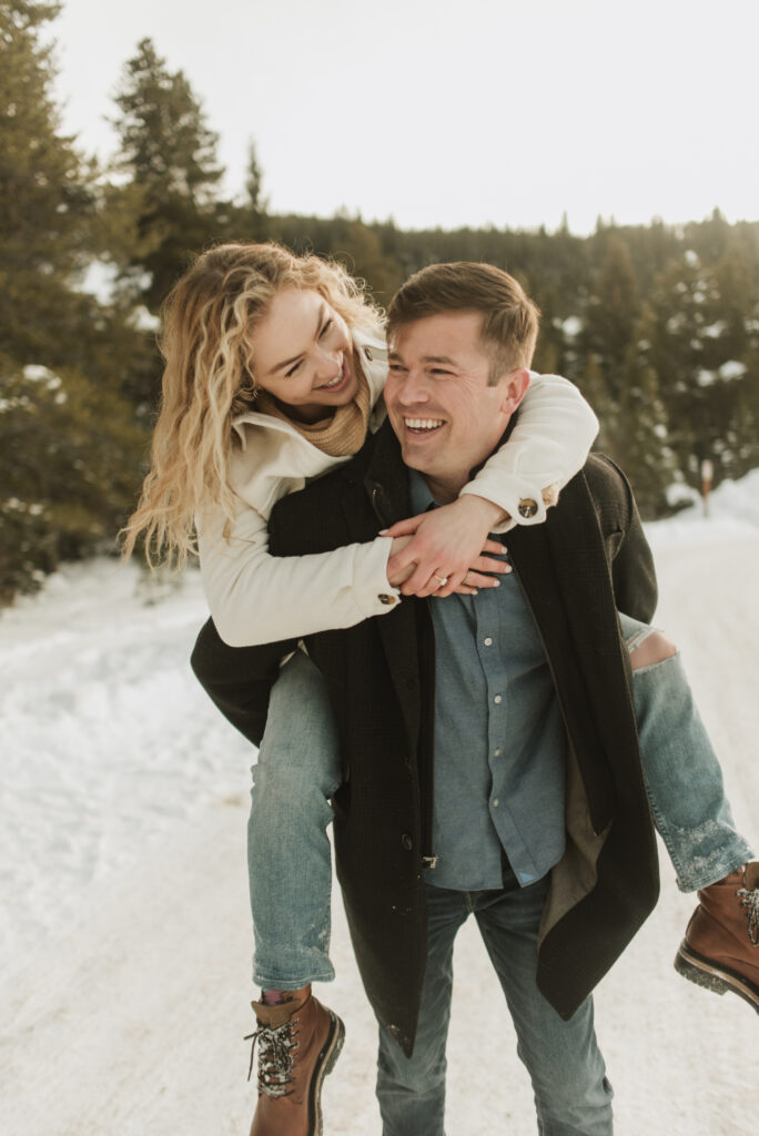 snowy colorado mountain winter engagement photos at keystone