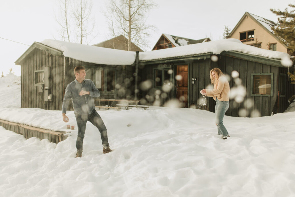 snowy colorado mountain winter engagement photos at keystone