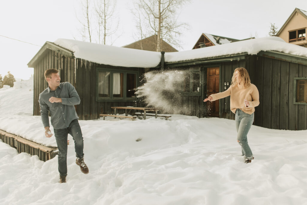 snowy colorado mountain winter engagement photos at keystone